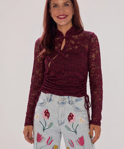 Bob & Bill bordeaux lace long-sleeve top with mandarin collar, keyhole cutout, and side-tie crop detail on a model.