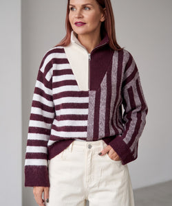 Bob & Bill Butch striped zipper pullover in purple and white worn by a woman with cream trousers