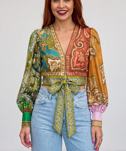 Bob & Bill Loa blouse in multi-coloured paisley print with V-neck, long sleeves, and front tie in linen-cotton blend