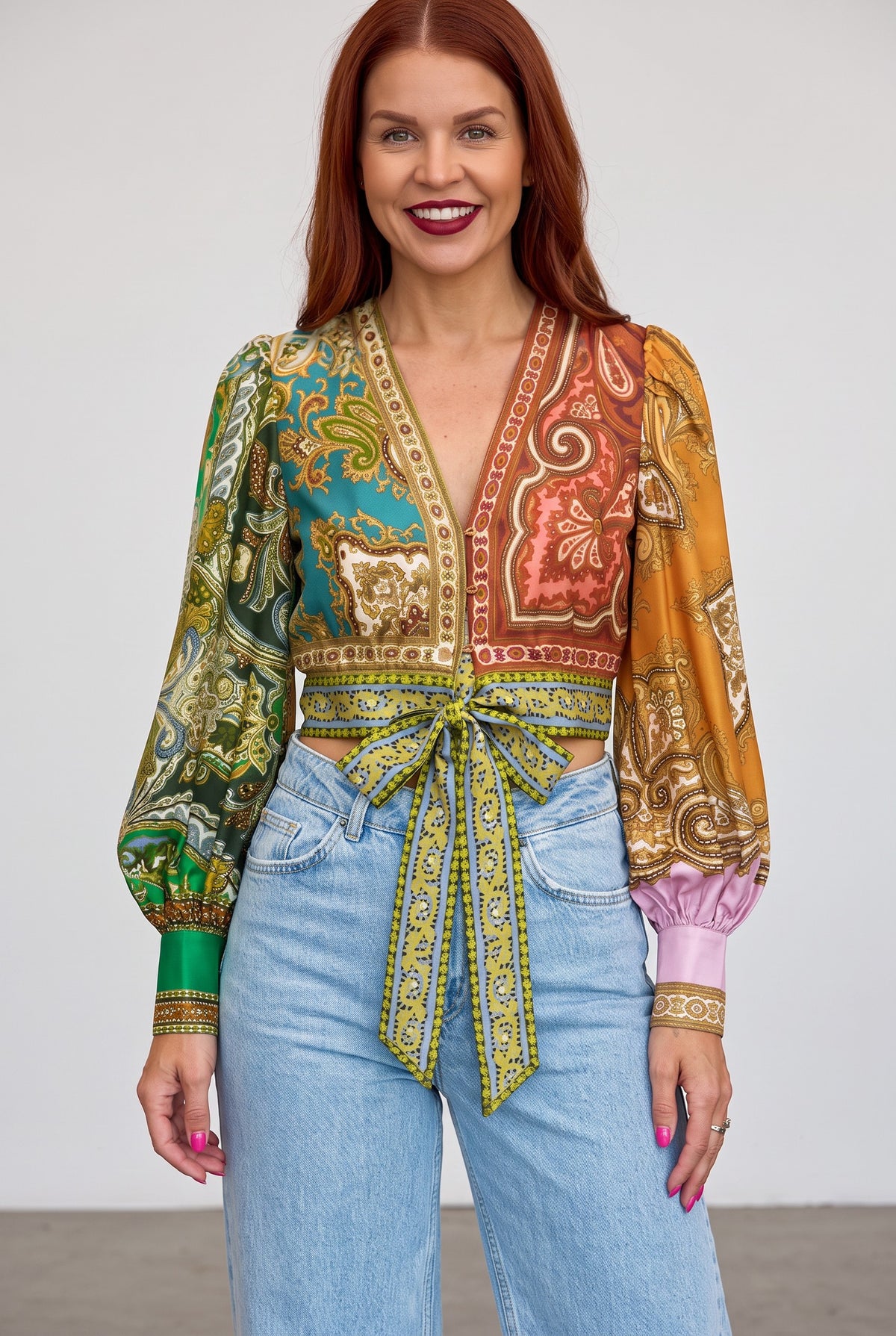 Bob & Bill Loa blouse in multi-coloured paisley print with V-neck, long sleeves, and front tie in linen-cotton blend