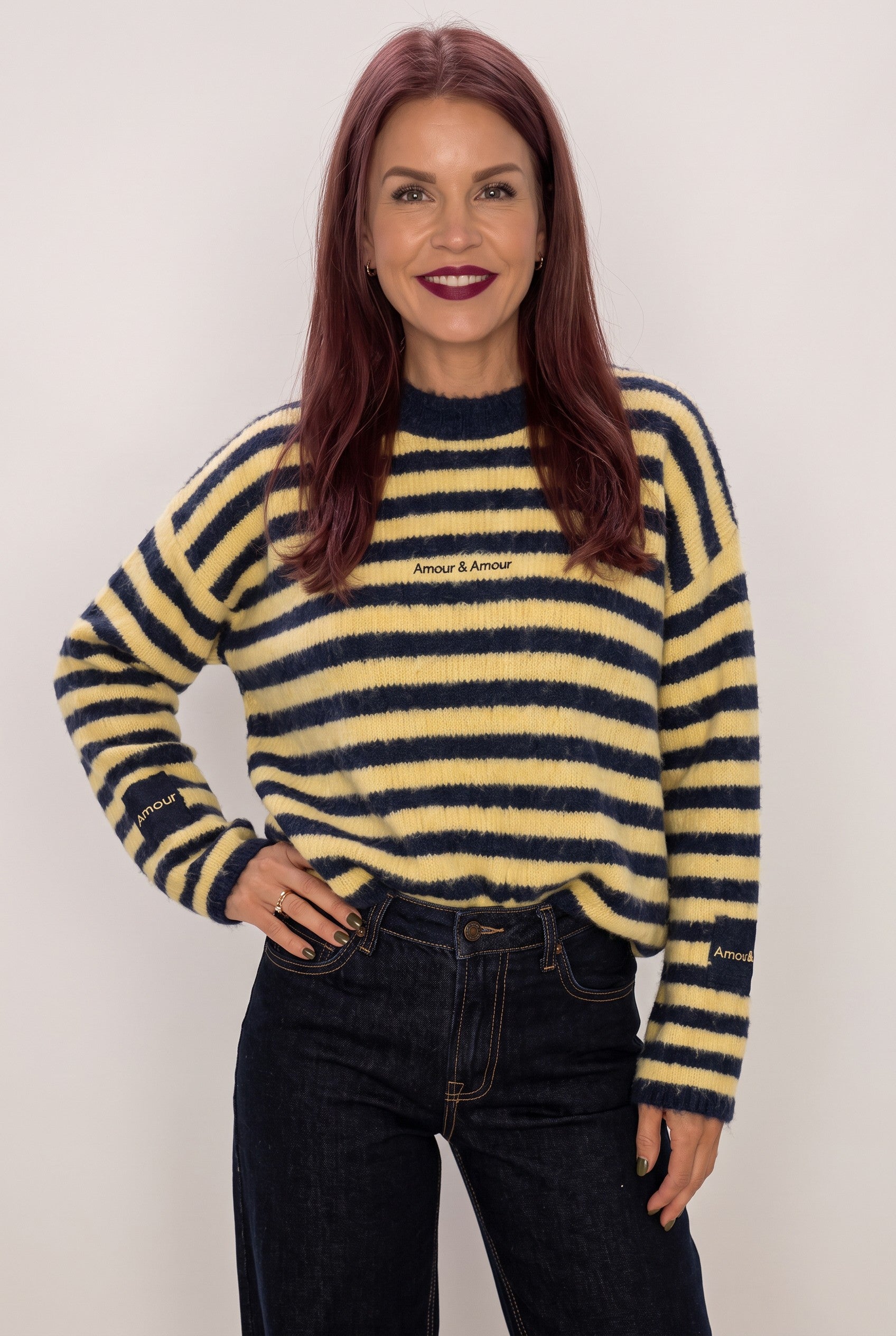 Bob & Bill Maren striped knit sweater in navy and yellow with oversized fit, round neck, and long sleeves.