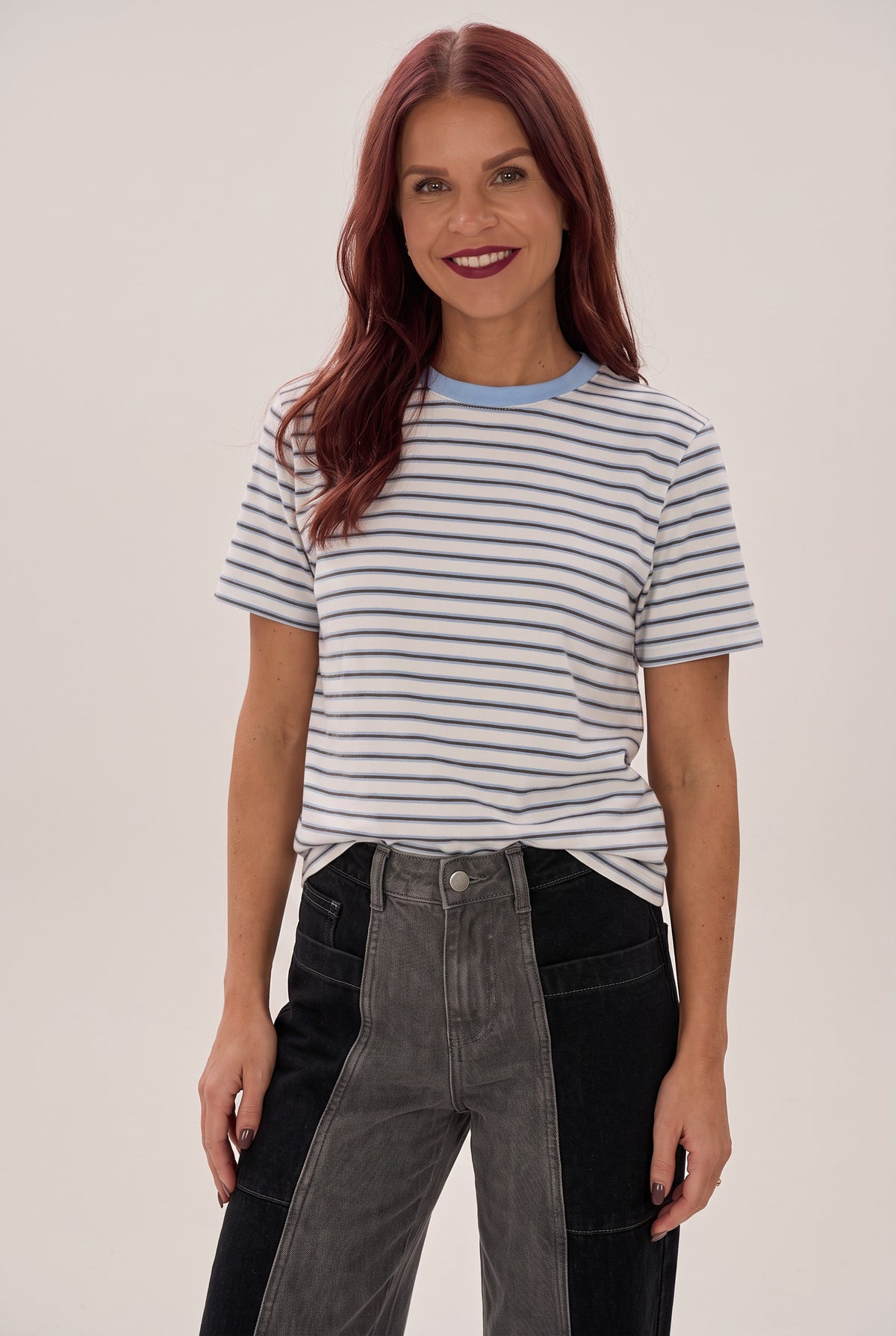 Bob & Bill Nanu striped viscose t-shirt in white with blue and burgundy stripes and a round neck on a female model