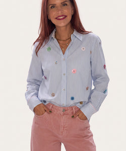 Bob & Bill Nümph Lili oversized blue striped shirt with colorful sequin floral embellishments worn by a woman
